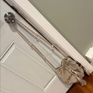 The Sak Cream Crochet Bucket Bag with Colorful Tassels